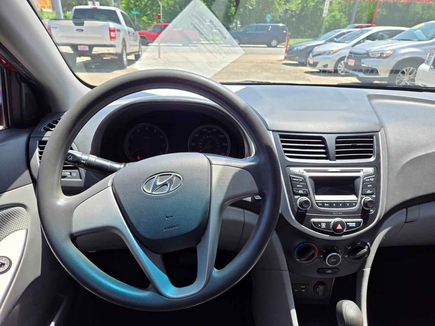 2014 Red Hyundai Accent GLS 4-Door (KMHCT4AE9EU) with an 1.6L L4 DOHC 16V engine, Automatic transmission, located at 503 West Court, Seguin, TX, 78155, (830) 379-3373, 29.568621, -97.969803 - Photo#5